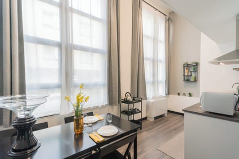 Apartment (1 Bedroom) | Living area | 32-inch TV with cable channels