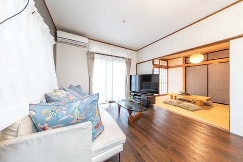 Villa, Non Smoking | Living area | Flat-screen TV