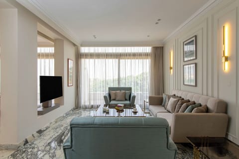 Apartment, Balcony, Golf View | Living area | Flat-screen TV