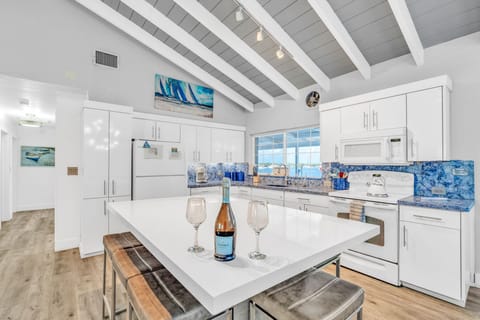 Kitchen area microwave, tea kettle and drip coffee maker