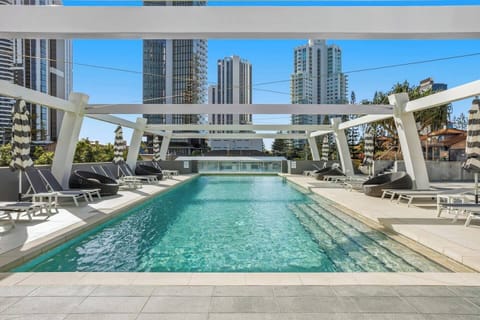 Cool off in the sparkling lap pool or bask in the sun on a lounger, your serene escape from the buzz of the Gold Coast.