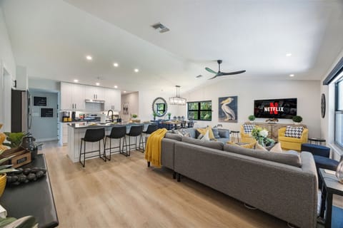 Chef’s kitchen with island opens to living and dining - great for groups!