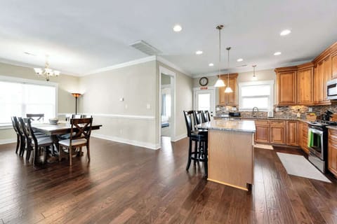 Dining area, kitchen and entrance to Bedroom 4.