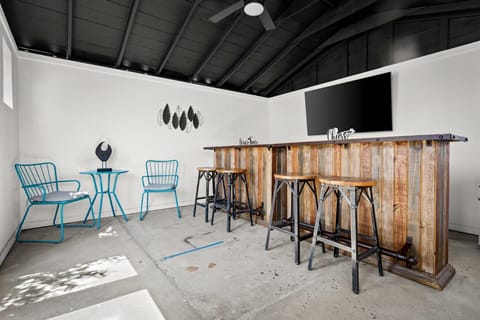 Our outdoor bar is fully equipped with a mounted TV, comfy seating, and everything you need for unforgettable afternoons and laid-back nights. Sip, relax, and catch the game — all without leaving your backyard paradise.