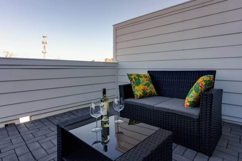 3rd floor balcony with outdoor seating