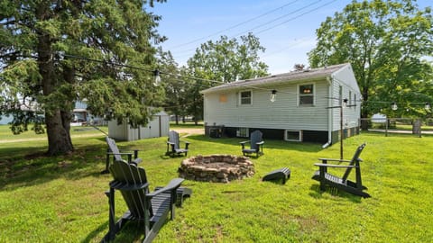 Enjoy the backyard fire ring and charming string lights.