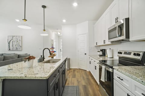 Kitchen – Fully Stocked with Modern Appliances