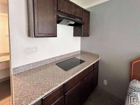 Full-size fridge, microwave, stovetop, toaster