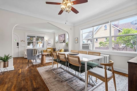 Sunlit table invites family-style dinners and cheerful morning breakfasts together.