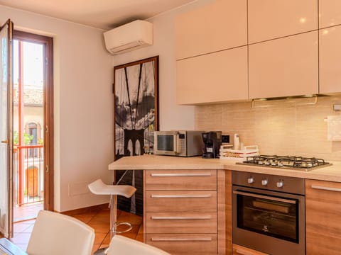 Furniture, Kitchen Appliance, Kitchen, Interior Design, Major Appliance, Flooring, Countertop, Wood, Cabinetry, Home Appliance