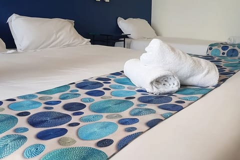 Relax on smooth sheets with soft towels ready for you.