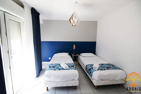 Enjoy flexible sleeping options in a bright twin bedroom.