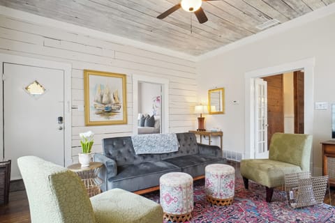 Relax and unwind in our spacious living room featuring cozy seating!