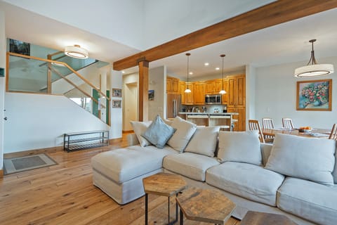 Large open plan great room with real wood fire