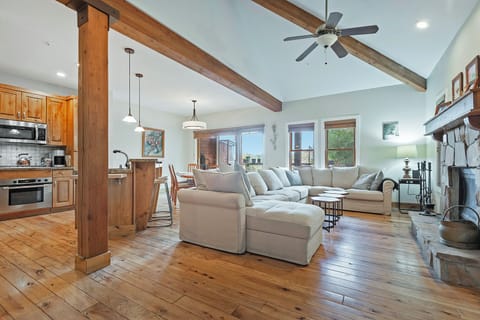 Large open plan great room with real wood fire