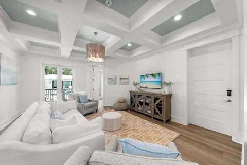 First floor living space features seating and a smart tv. Perfect for unwinding before bed.