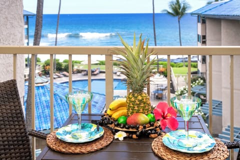 Relax on your breezy private lanai featuring comfortable seating and wide-open ocean views—perfect for morning coffee, sunset watching, or unwinding after a day of adventure.