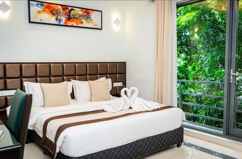 Deluxe Double Room, Balcony | In-room safe, iron/ironing board, free WiFi