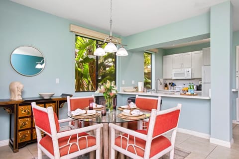 Chic dining area with bold island colors and seating for four

 GCH-121
