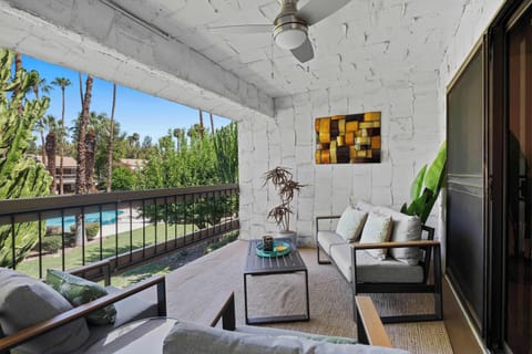 Condo, 1 King Bed with Sofa bed, Balcony, Pool View (Sunset Palmar) | Living area | 50-inch flat-screen TV with digital channels