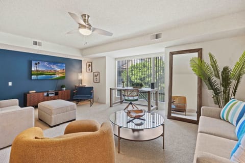 Condo, 1 King Bed with Sofa bed, Balcony, Pool View (Sunset Palmar) | Living area | 50-inch flat-screen TV with digital channels