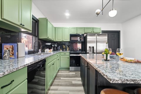 Modern kitchen with island & full amenities.