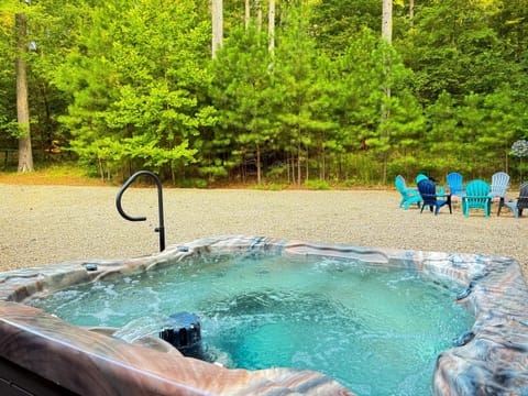 Soak under the trees in your own secluded spa.