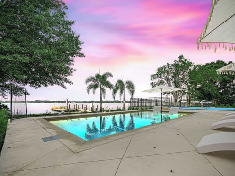 As the sky melts into dreamy shades of purple and gold, our pool becomes the ultimate twilight playground—dive in, float away, or just lounge with a drink as the night begins to sparkle.