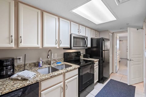 This kitchen is fully equipped for whipping up your favorite vacation meals. Loaded with drip and keurig, coffee maker, double sink, stove/oven, full refrigerator, dishwasher, microwave, cooking basics, silverware, and dinnerware. Extra option!