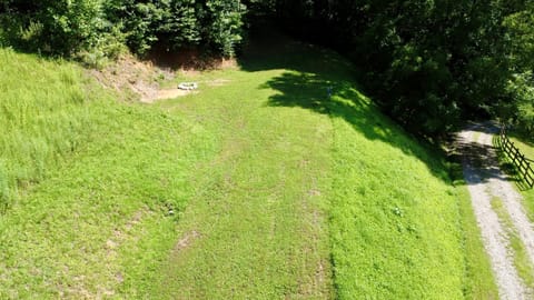 Site 4 nestled in the mountains with pasture views.