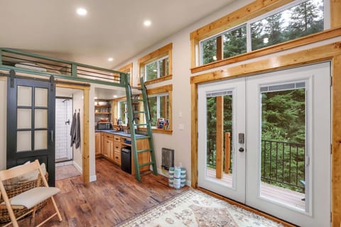 Cozy up in this beautifully crafted woodland retreat with all the comforts of home