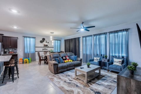 Enjoy the reclining couch as you relax watching TV or catching up w/ family and friends in the open concept living room
