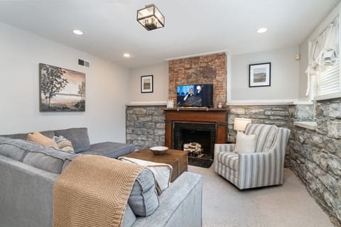 Main living area featuring a Smart TV and cozy furnishings.