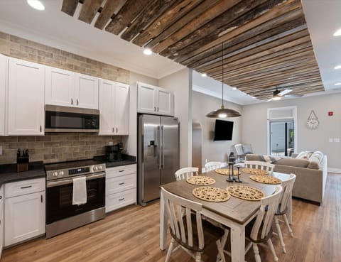 The charming eat-in kitchen offers ample space & every home comfort​