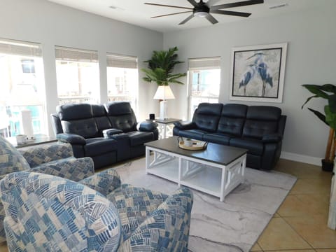 Spacious living room with cozy seating and natural light
