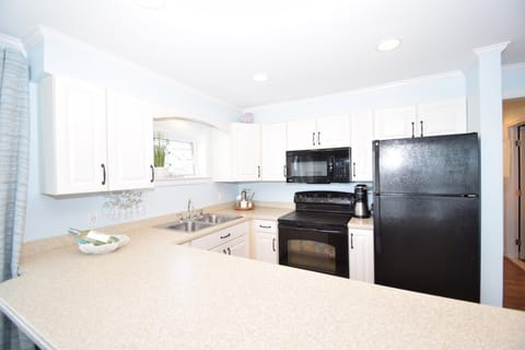 Condo, 2 Bedrooms | Private kitchen | Fridge, coffee/tea maker, toaster