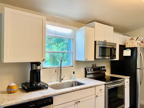 Fully stocked kitchen, starter supply of coffee, cream, paper towels, salt&p