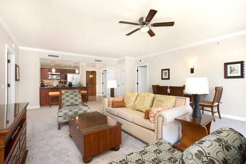 Bright island suite with spacious seating, full kitchen, and dining area. HKK-343