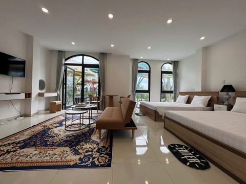 Superior Quadruple Room, Balcony, Garden View | Desk, free WiFi, bed sheets