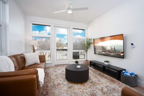 Amazing views of the Capitol building with luxury leather couches and a 75` tv set!