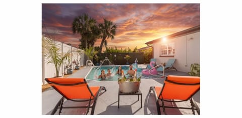Once the sun goes down, the pool lights create a magical evening ambience