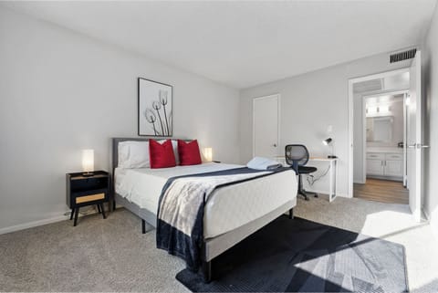 Peaceful bedroom with a plush queen bed and soft linens.