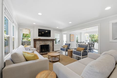 Open and bright, main living room that easily seats 7. 