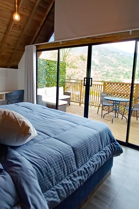 Deluxe Double Room, 1 King Bed, Jetted Tub, Mountain View | Minibar, desk, laptop workspace, free WiFi