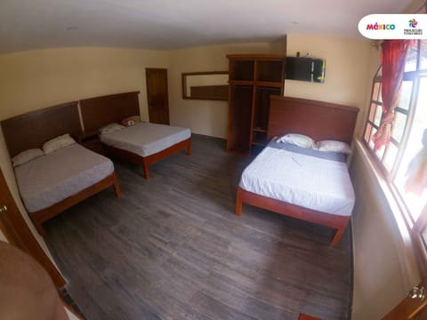 Family Triple Room, Mountain View | Desk, laptop workspace, blackout drapes, free WiFi