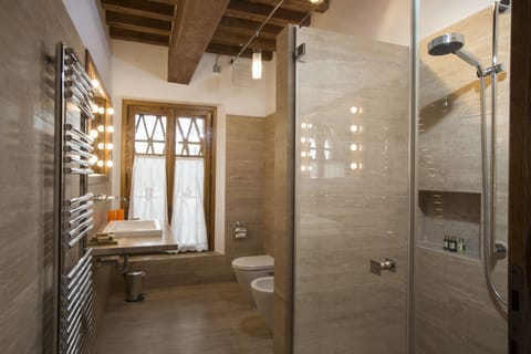 Shower, free toiletries, hair dryer, slippers