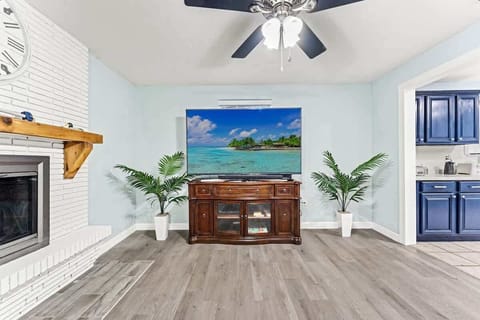 View of the living room

This is where you and your family can relax after a day at the beach, visiting family, or exploring Northeast Florida.

- Newly renovated
- Large leather sofa
- Fireplace with one starter log and logs to enjoy
- 55" HDTV