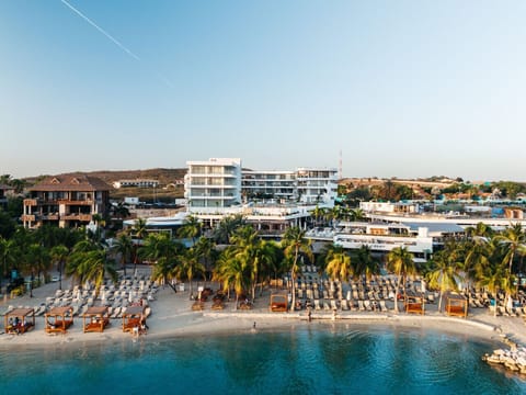 Sunset views over Mambo Beach with direct access to the beautiful beach clubs.