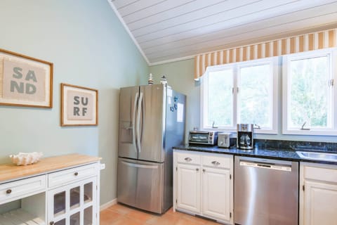 There is also a stainless steel refrigerator.