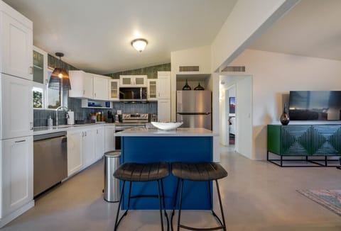 Updated, well-equipped, and fully stocked kitchen with island